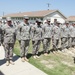 316th ESC soldiers are presented the unit coin