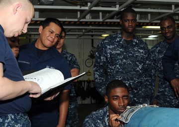 USS George H.W. Bush sailors train