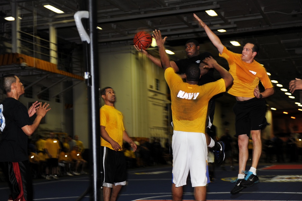 USS George H.W. Bush sailors play basketball