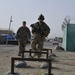 Pfc. Stephen Roph jumps hurdle