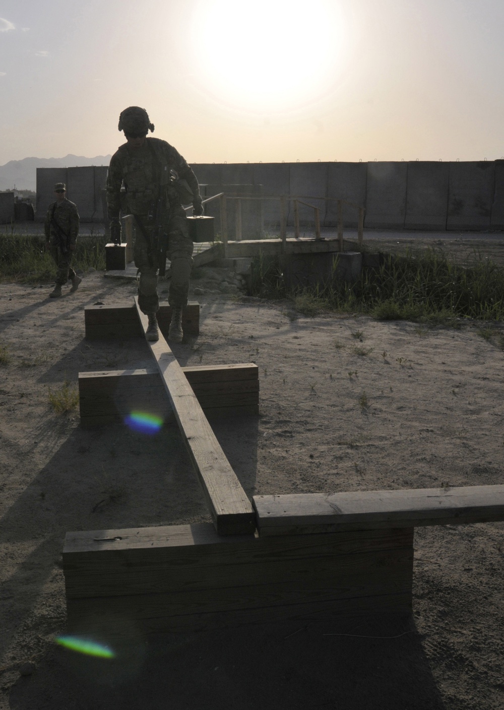 Staff Sgt. Brian Wagner walks across the balance beam