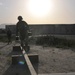 Staff Sgt. Brian Wagner walks across the balance beam