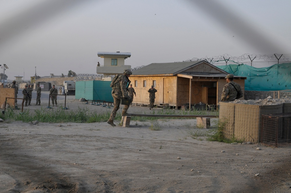 Soldier walks across the balance beam