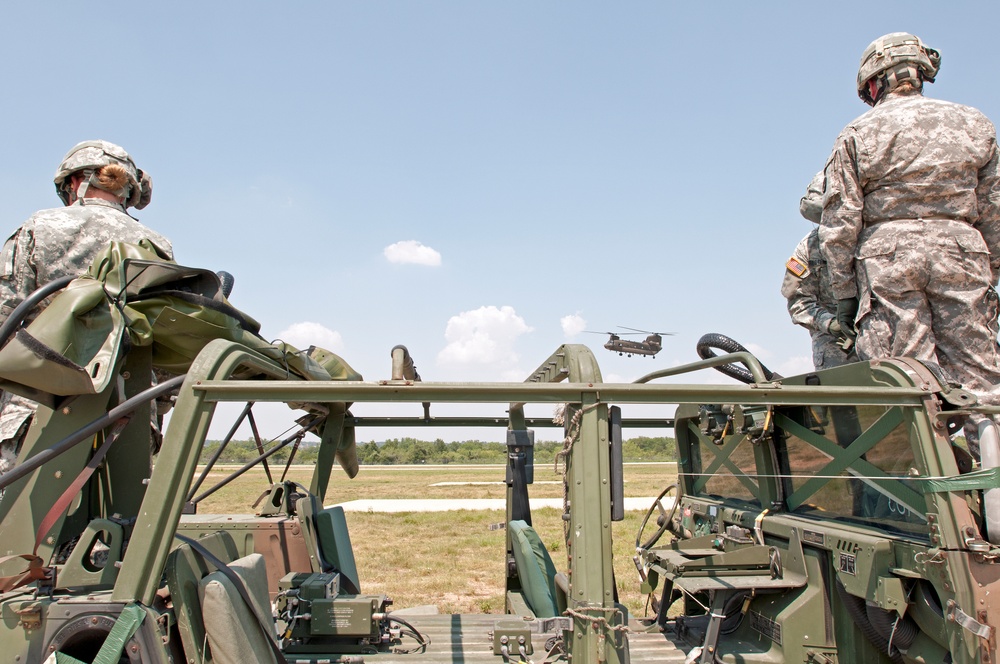 316th ESC soldiers wait for a CH-47 Chinook