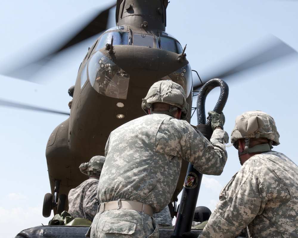 316th ESC soldiers prepare to sling load with a CH-47 Chinook