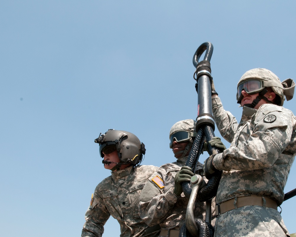 316th ESC soldiers prepare to sling load with a CH-47 Chinook