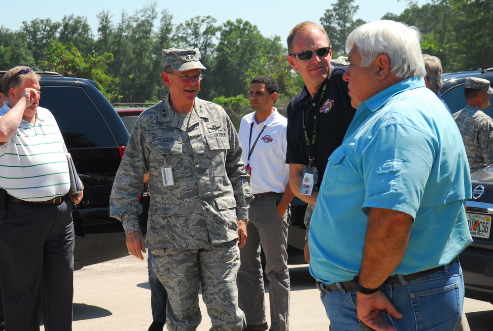 Florida Governor Rick Scott visits residents impacted by Tropical Storm Debby