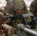 U.S. Marine and New Zealand gunners fire cannons in snowstorm to conclude Exercise Brimstone
