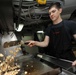 USS Abraham Lincoln sailor preps lunch