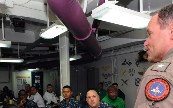 CSG 8 commander speaks to sailors