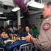 CSG 8 commander speaks to sailors