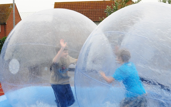 Children enjoy 'zorbing' at youth center
