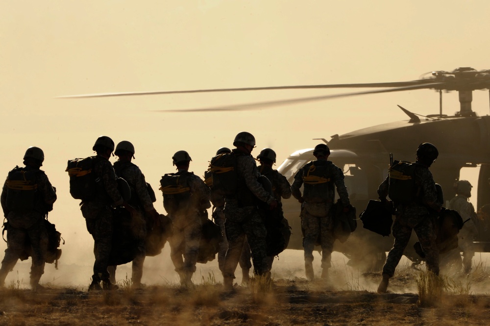 2nd Battalion 19th Special Forces Group fly on a UH-60L Black Hawk by the Detachment 2, Company C, 1st General