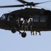 2nd Battalion 19th Special Forces Group fly on a UH-60L Black Hawk by the Detachment 2, Company C, 1st General