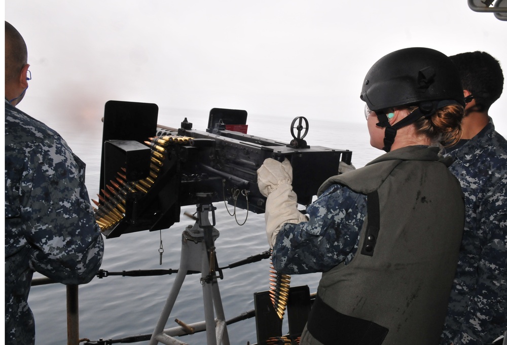 Midshipmen fire .50-caliber machine gun