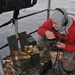 Midshipmen fire .50-caliber machine gun