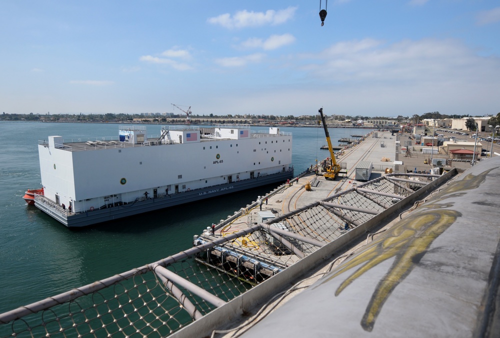 Barracks Ship (APL-65) arrives at Naval Air station North Island