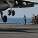 Guiding an F/A-18 onto the flight deck of USS George Washington