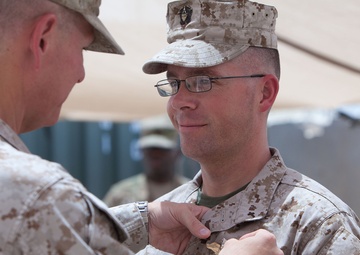Sailors earn Fleet Marine Force pins aboard Camp Dwyer