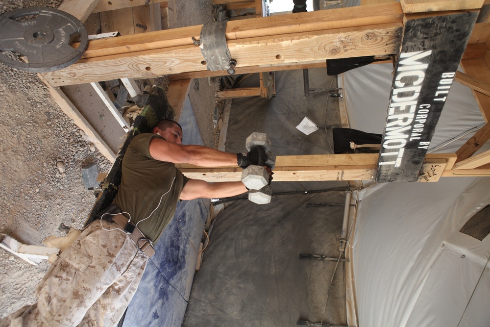 Marine builds gym during down time in Afghanistan