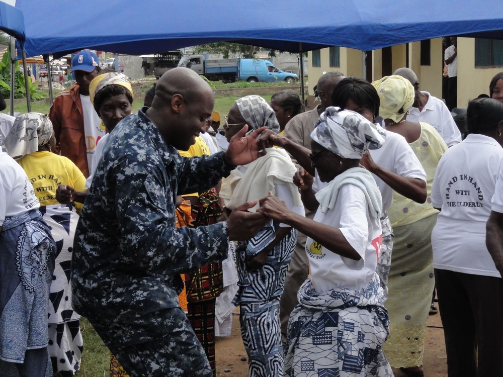 US Naval Forces Europe Band 'Topside,' performs with a musician from Benin Fire Safety Patrol Band