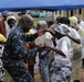 US Naval Forces Europe Band 'Topside,' performs with a musician from Benin Fire Safety Patrol Band