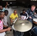 US Naval Forces Europe Band 'Topside,' performs with a musician from Benin Fire Safety Patrol Band