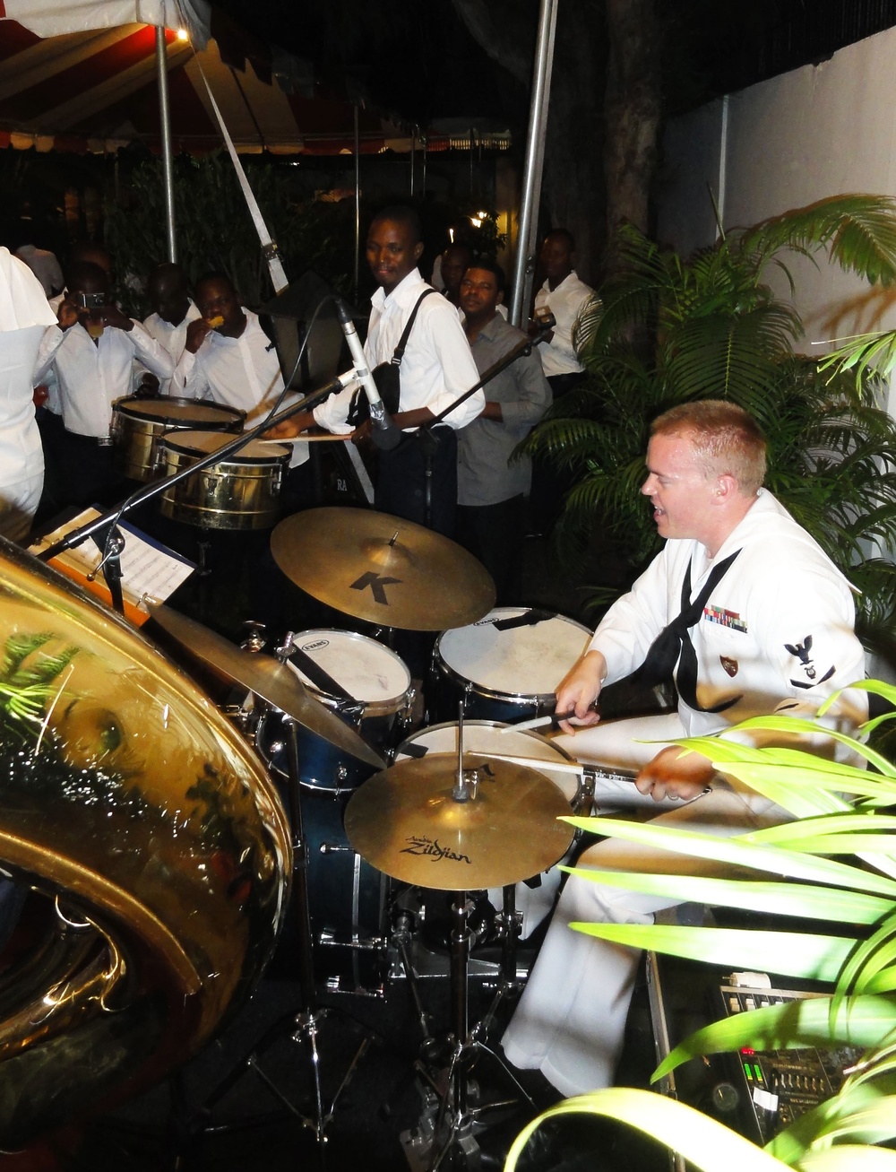 US Naval Forces Europe Band 'Topside,' performs with a musician from Benin Fire Safety Patrol Band