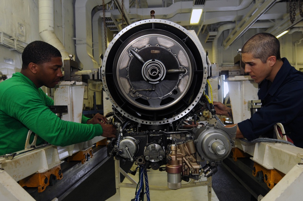 USS Dwight D. Eisenhower sailors at work