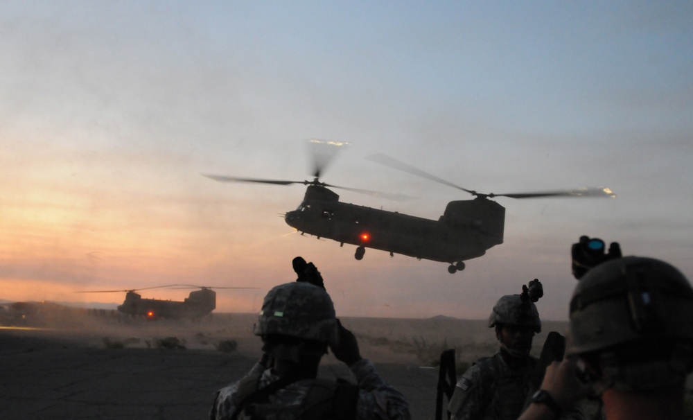 Chinook helicopters land for night mission