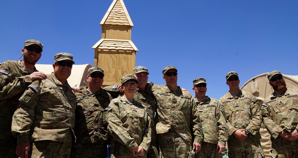 Kentucky soldiers share a group photo in Afghanistan after two are baptized