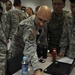 Staff Sgt. Burton explains map info during Tiger Balm