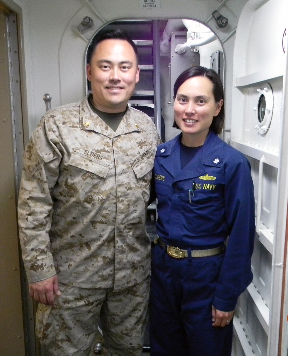 Marine brother and Sailor sister link up while deployed at sea