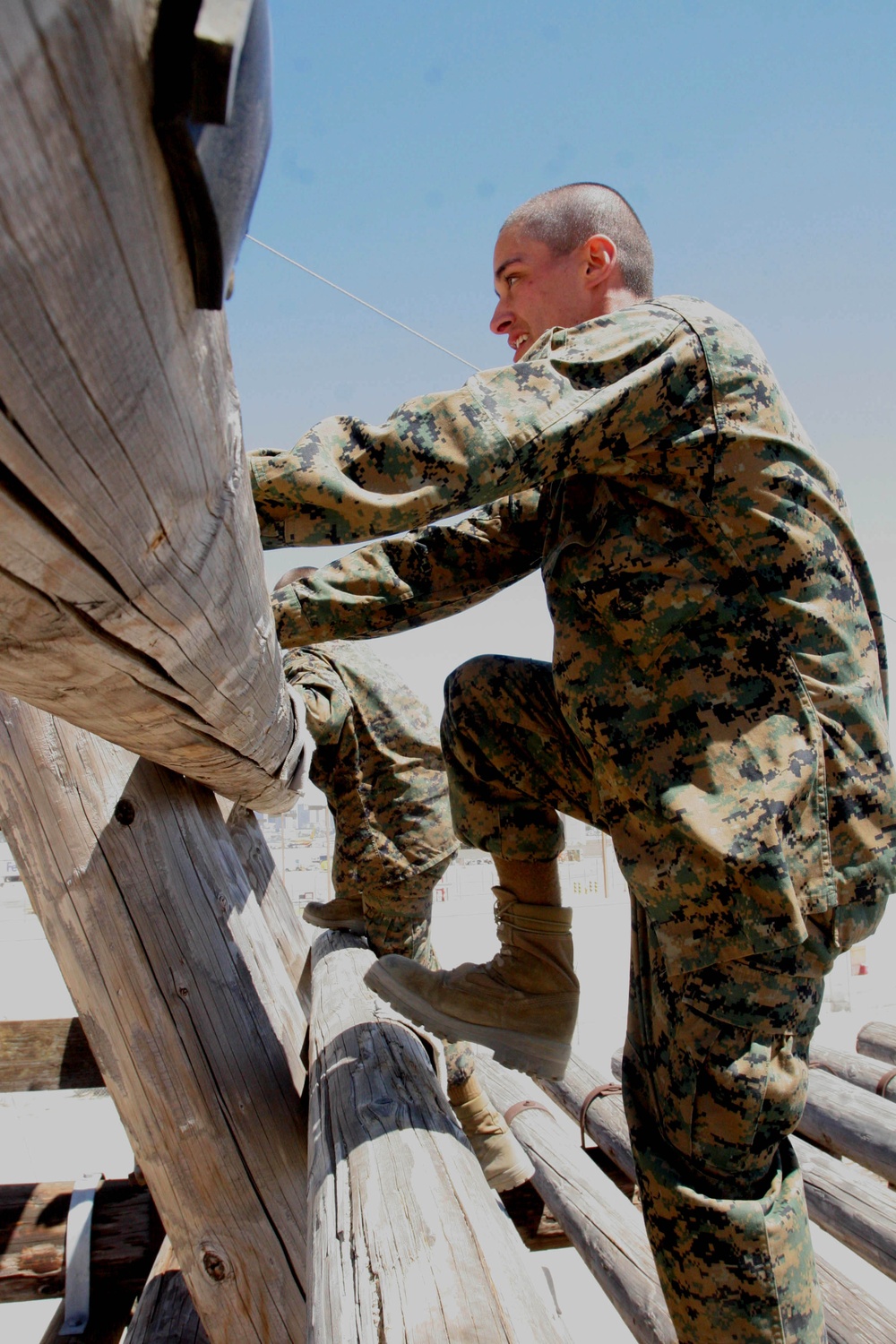Co. L recruits attack high obstacles at Confidence Course