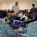 Singaporean soldiers learn computer system for bilateral exercise