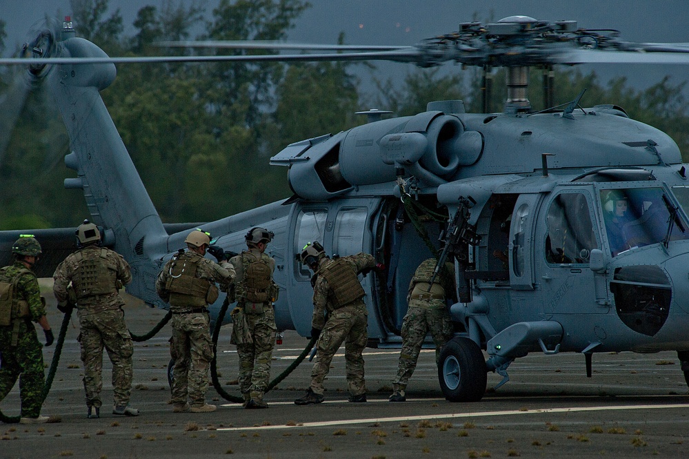 Multinational EOD teams conduct fast rope training during RIMPAC 2012