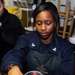 USS George H.W. Bush sailor pours cup of coffee