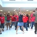 Flash mob catches base patrons by surprise