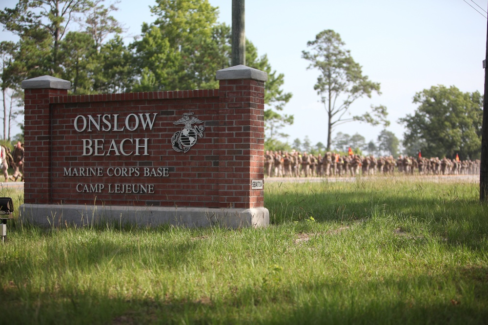 Marine, sailors set the pace during 8th ESB hike