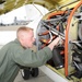 NAF Misawa crew members conduct pre-flight inspection on UC-12F Huron