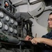 USS Nimitz sailor at work