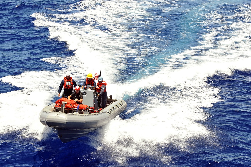 USS McCampbell sailors return after man overboard drill at sea