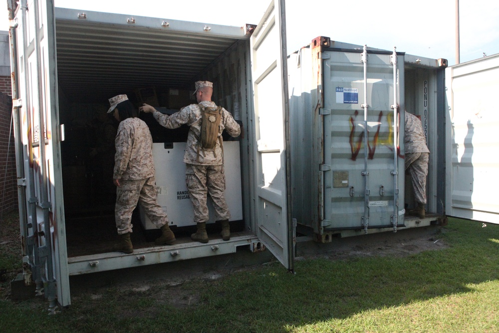 Marine prepare shelters to support during stormy skies
