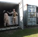 Marine prepare shelters to support during stormy skies