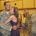 Soldier embraces spouse after yearlong deployment