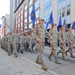 Local Air National Guard members march in the city’s Veterans Day parade