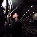 USS Abraham Lincoln sailor performs maintenance