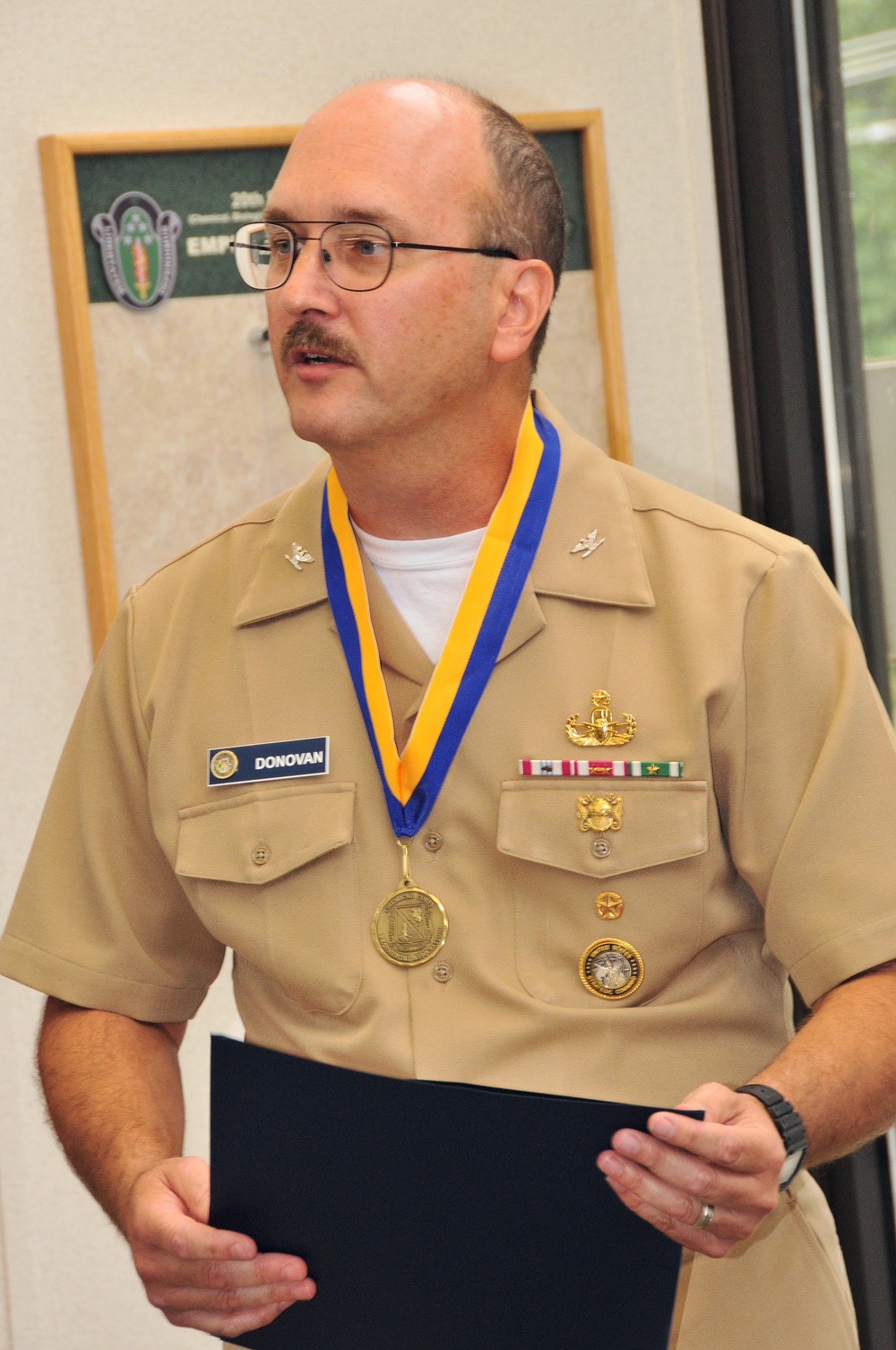 Navy captain inducted into Order of the Dragon