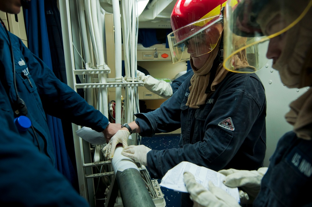 Sailors conduct drill aboard USS McCampbell