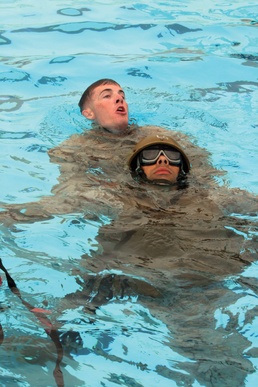 Marines swim through challenging water-rescue course